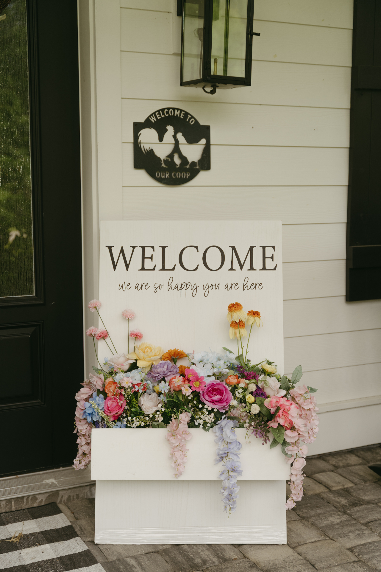 Floral welcome sign rental with colorful flowers